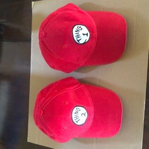 Universal Studios Thing 1 and Thing 2 red caps.